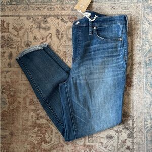 Madewell high rise skinny jeans, frayed at bottom. Size 32, NWT